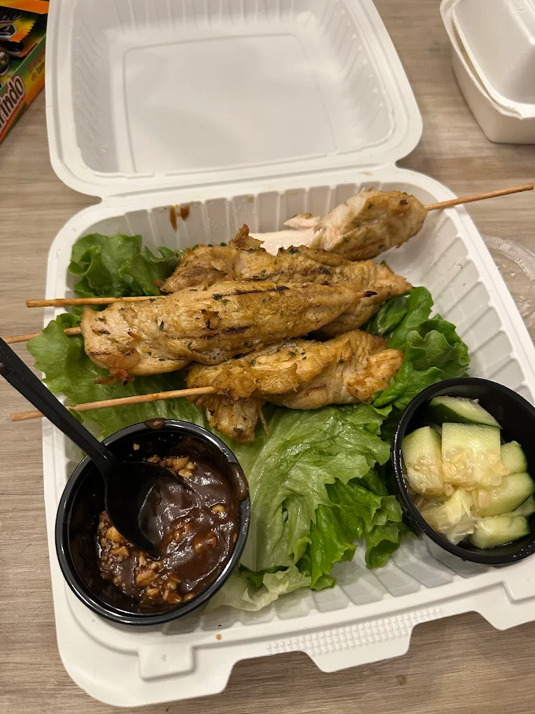 Chicken Satay skewers with peanut sauce at Pho Ngon